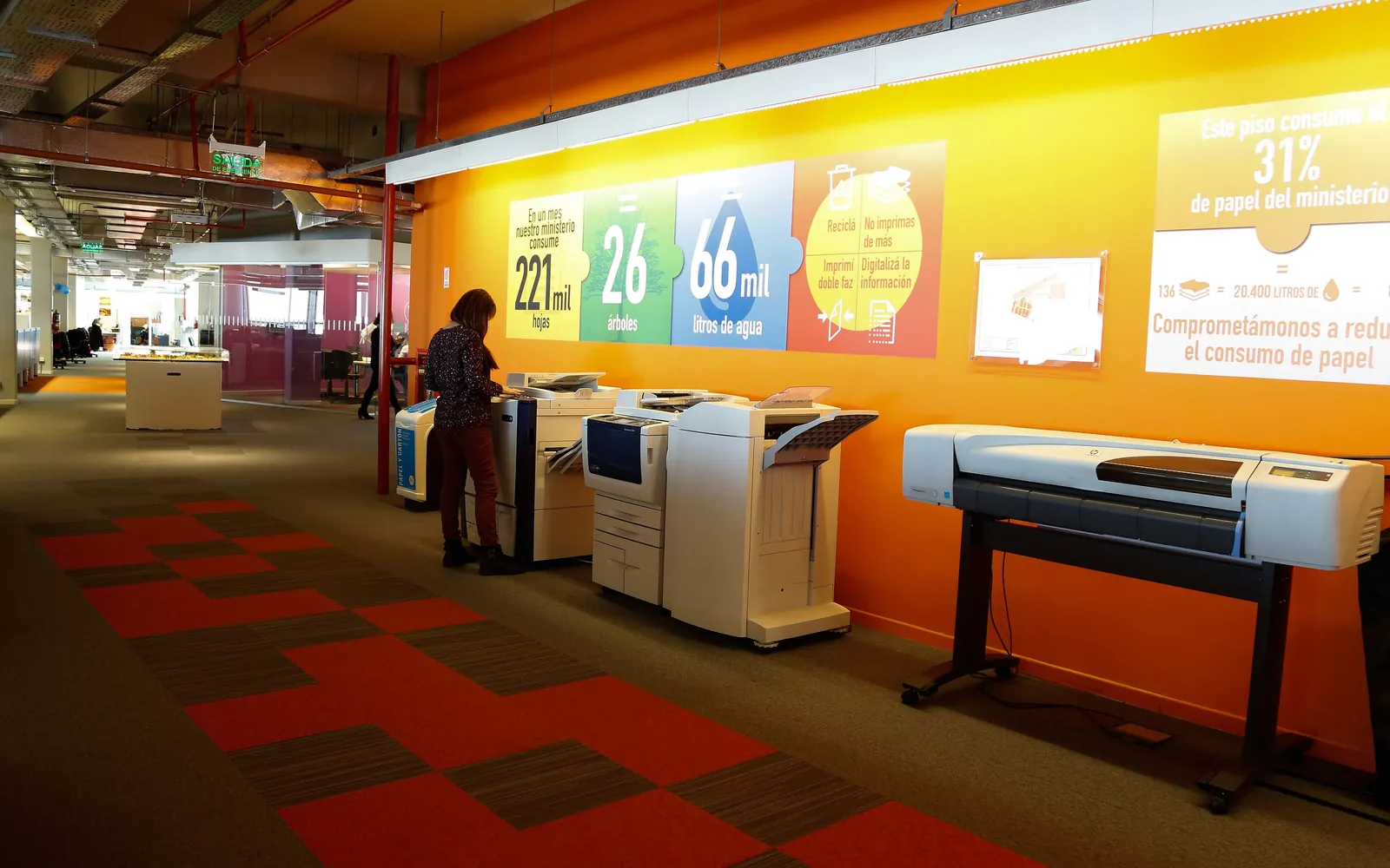 A shared print and copy area in an open-plan office